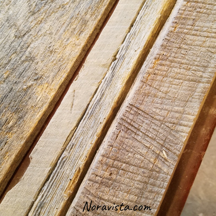 Reclaimed oak barn wood up close view before milling